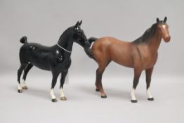 Two Beswick horses: Hackney 1361, black gloss and Swish Tail 1182, brown matt