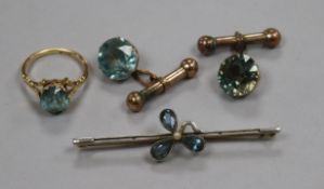 A 15ct gold and blue zircon ring, an early 20th century 15ct gold and gem set bar brooch and a