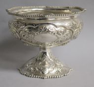 A Victorian repousse silver pedestal bowl, Robert Hennell III, London, 1860, 11.5cm, 10.5 oz.