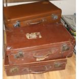 Four leather suitcases