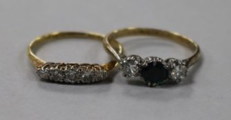 An 18ct gold and five stone diamond half hoop ring and an 18ct gold, sapphire and diamond three