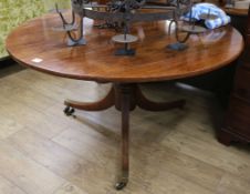 A Regency mahogany circular topped breakfast table W.130cm