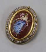 A yellow metal and micro mosaic pendant brooch decorated with the figure of a lady, 33mm.