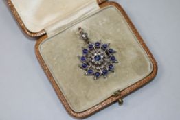 A late Victorian yellow metal, cabochon sapphire and diamond set pendant brooch, brooch diameter