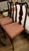 A pair of Edwardian inlaid mahogany salon chairs