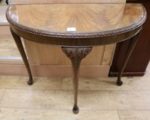 A 1930's 'D' shaped side table W.88cm