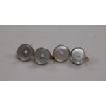 A set of four Larter & Co. 14K gold dress studs set mother of pearl and seed pearls, 10g gross.