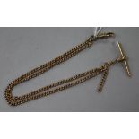 A 9ct gold watch chain with T-bar.