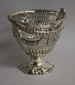 A Victorian pierced silver vase shaped sugar basket (no liner) by Roberts & Belk, Sheffield, 1873,