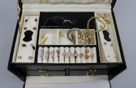 A jewellery box of costume jewellery and five gold plated Rotary watches.