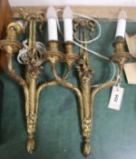 A pair of Louis XVI ormolu twin-branch wall lights height 48cm