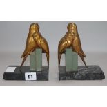 A pair of Art Deco budgie bookends height 16cm