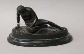 A classical seated bronze figure