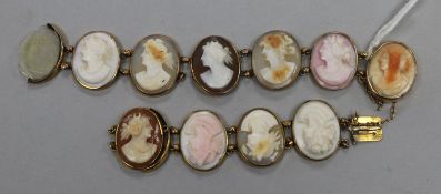 A yellow metal and oval cameo set bracelet.