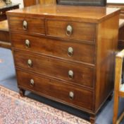 A George III mahogany chest of four long graduated drawers W.100cm