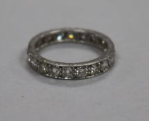 A platinum and diamond full eternity ring, set with twenty round cut diamonds and numbered 6122,