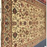 A cream ground Tabriz carpet 335 x 235cm