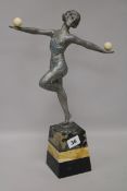 A 1930's spelter dancing girl with ball height 40cm width 25cm