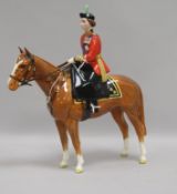 A Beswick model of H.M. The Queen mounted on "Imperial", Trooping the Colours