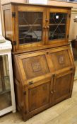 A 1920's oak bureau bookcase W.88cm