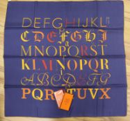 A Hermes scarf and knotting cards, all boxed