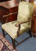A George III mahogany "Gainsborough" armchair
