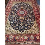 An Isfahan ivory ground carpet 340 x 235cm