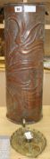 A Copper Newlyn School umbrella stand and a Newlyn School chamberstick umbrella stand height 60cm