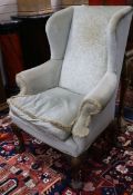 A George III style wing armchair