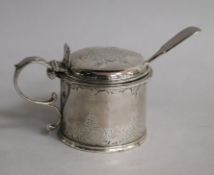 A Victorian silver drum mustard with engraved decoration, London, 1848 and a silver mustard ladle.