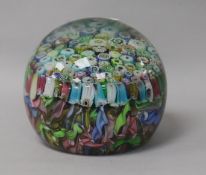 A Murano close-packed millefiori glass paperweight