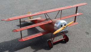 A model of a Fokker Dr1 fighter aircraft in the Red Baron's livery length 150cm width 186cm