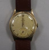 A gentleman's 1950's 9ct gold Omega manual wind wrist watch, movement c.266.