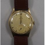 A gentleman's 1950's 9ct gold Omega manual wind wrist watch, movement c.266.