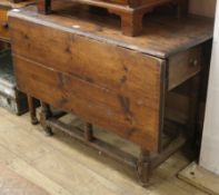 A Victorian pine drop flap table