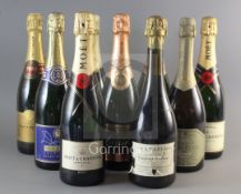 Nine assorted bottles of champagne including two Lanson, two Moet & Chandon, one Tattinger, 1990 and