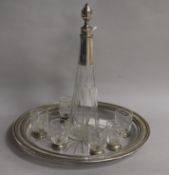 A French 800 standard silver-mounted cut glass liqueur set, comprising a small decanter of narrow