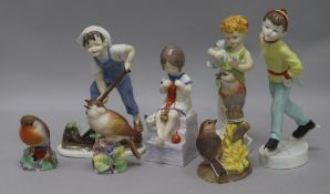 Four Royal Worcester 'Child' figures and three models of songbirds, the figures including Saturday'