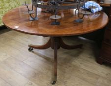 An Anglo-Indian Regency padouk wood circular breakfast table W.130cm