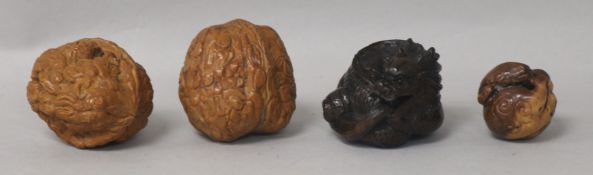 Two Chinese carved walnuts and two netsukes