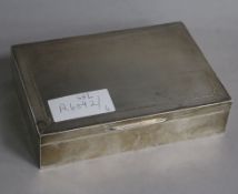 A 1950's engine turned silver cigarette box, 16.5cm.