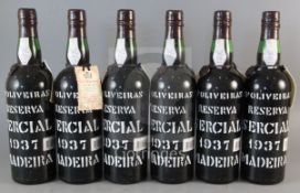 Six bottles of D'Oliveiras Reserva Sercial Madeira, 1937.