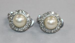 A pair of white metal diamond and cultured pearl cluster ear clips, 12mm.