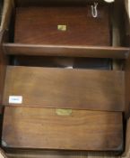 A Georgian mahogany two-division tea caddy and three other items, including a brass-bound writing