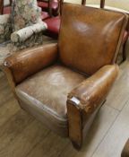 A vintage leather club armchair