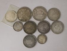 A collection of Queen Victoria 1887 half crowns and double florins and 1916 florin nef
