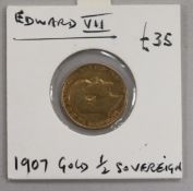 An Edward VII gold half sovereign, 1907, in sealed card and plastic mount 3.9g net, GF