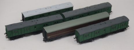 A collection of 46 Bachmann, Southern Pride and other coaches and goods wagons in a mixture of green