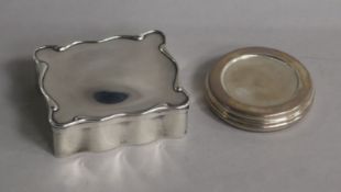 An Edwardian silver trinket box, a sterling silver travelling telescopic cup and two sterling silver