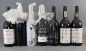 Four bottles of Grahams 1977 Vintage Port and three bottles of 1963 Vintage Port (Gonzalez, Byass).